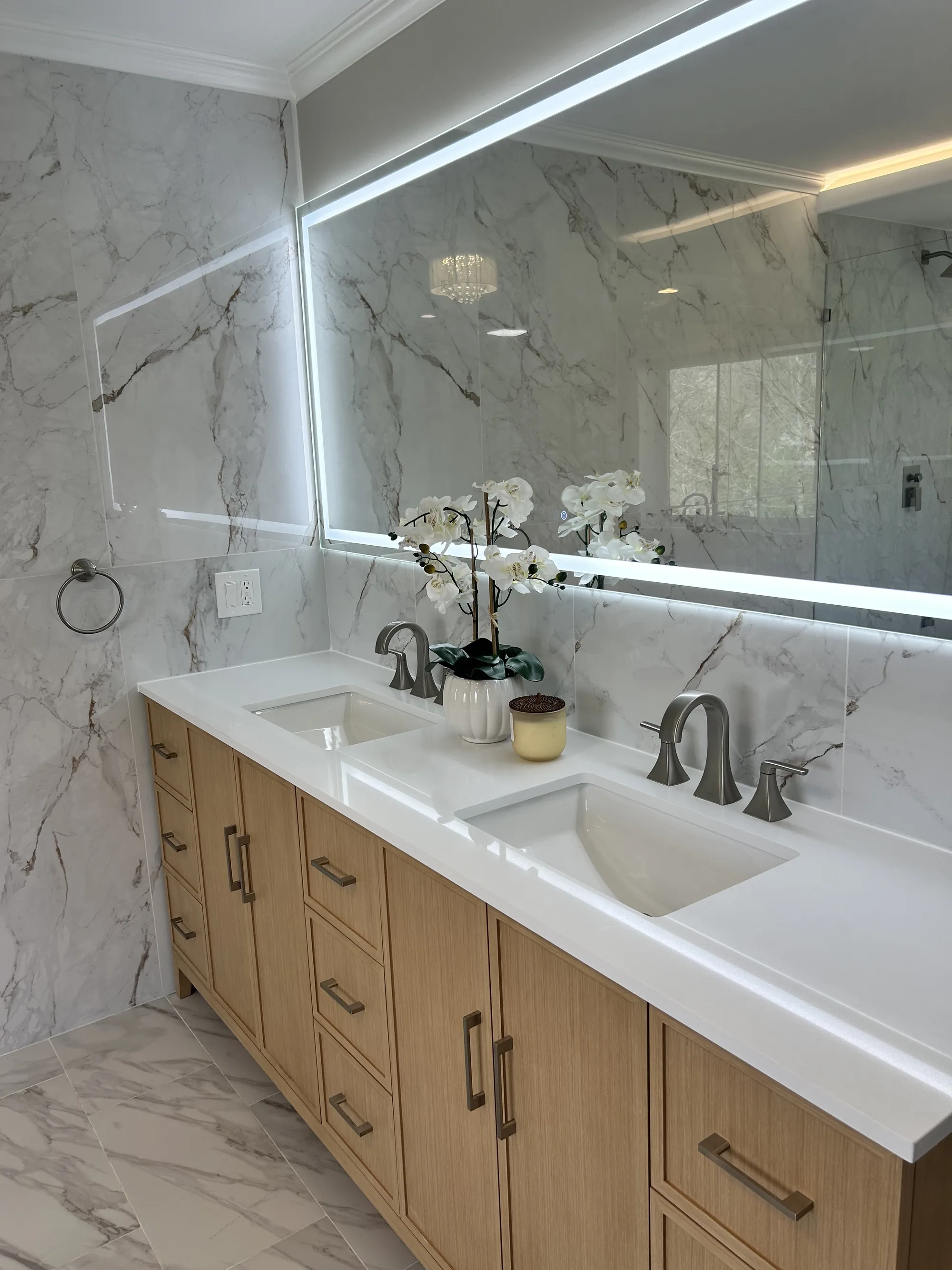 Spotless marble bathroom with a double vanity after a residential deep clean in Cincinnati