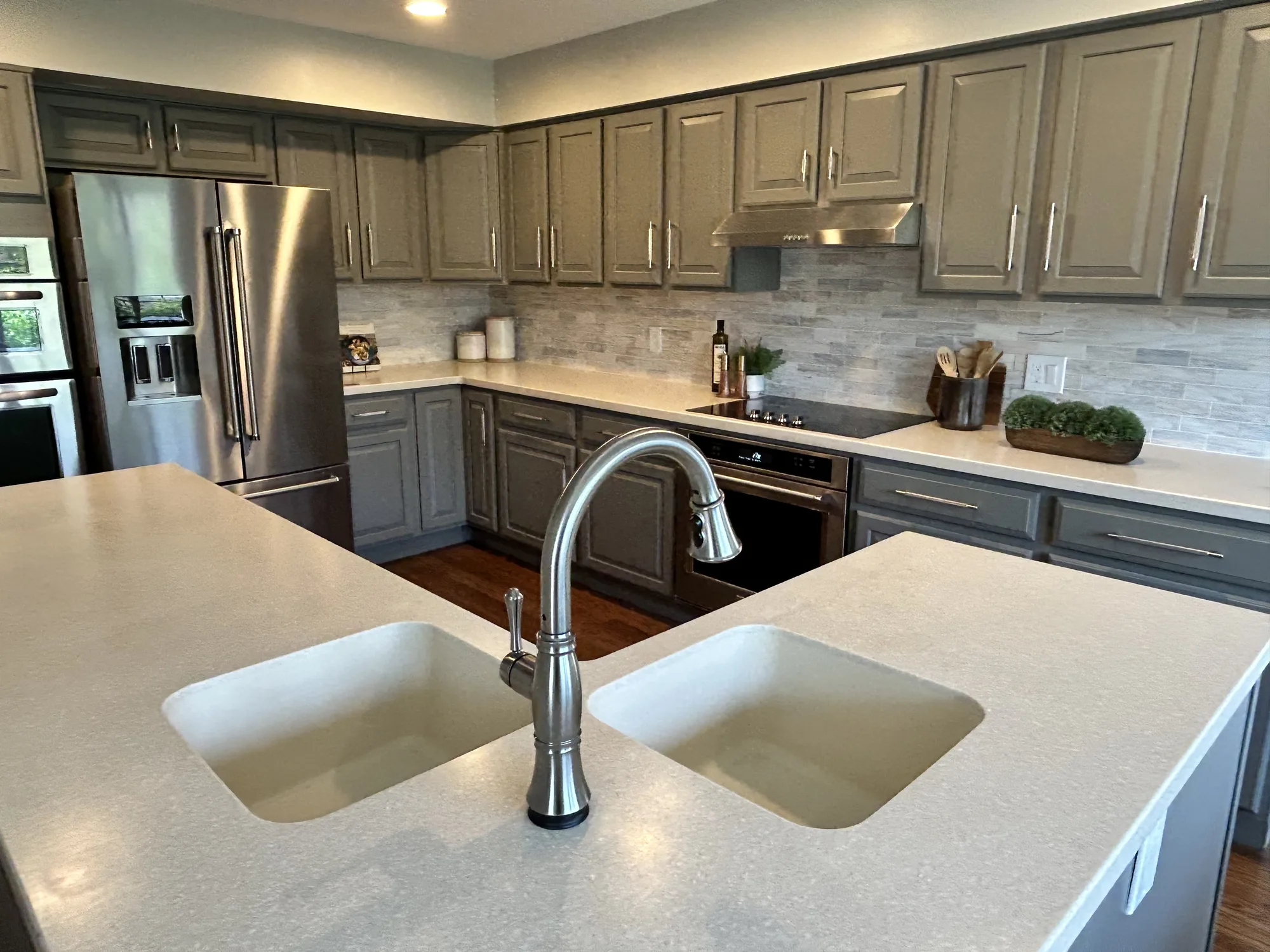 Clean, comfortable kitchen with stainless appliances kept fresh by recurring cleaning in Cincinnati