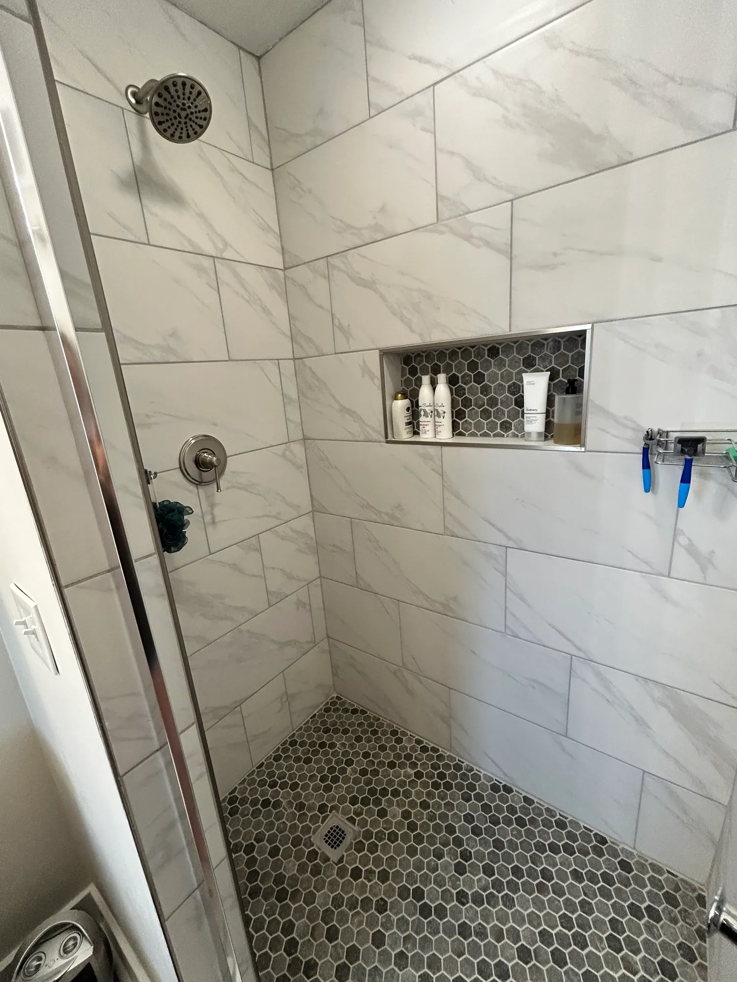 Move-in-ready marble tile walk-in shower, cleaned and detailed in Cincinnati
